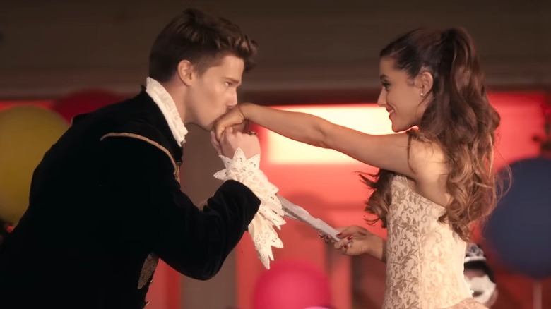 Patrick Schwarzenegger kissing Ariana Grande's hand