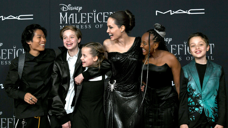 Pax, family at "Maleficent" premiere 