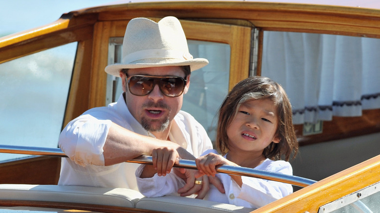 Brad Pitt, young Pax on boat