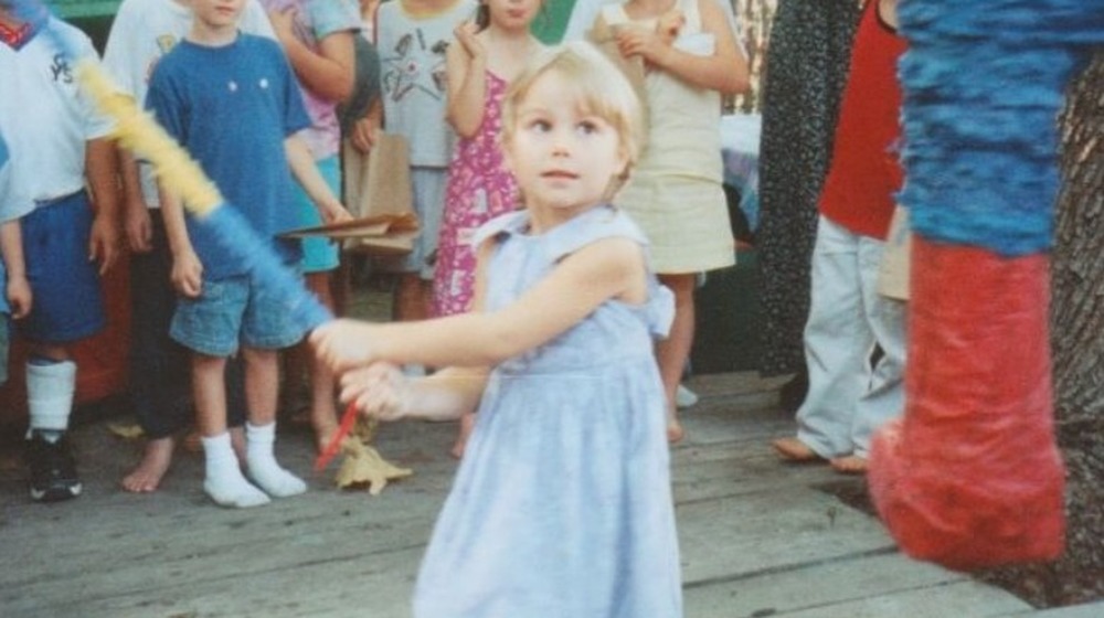 Young Phoebe Bridgers hits a piñata