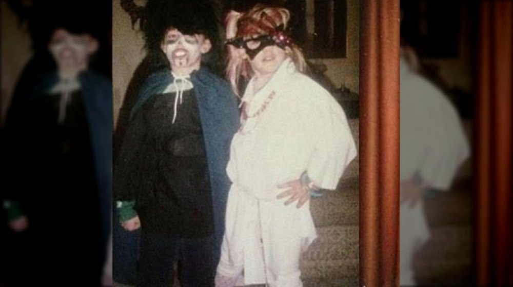 Pink as a teenager on Halloween with her brother