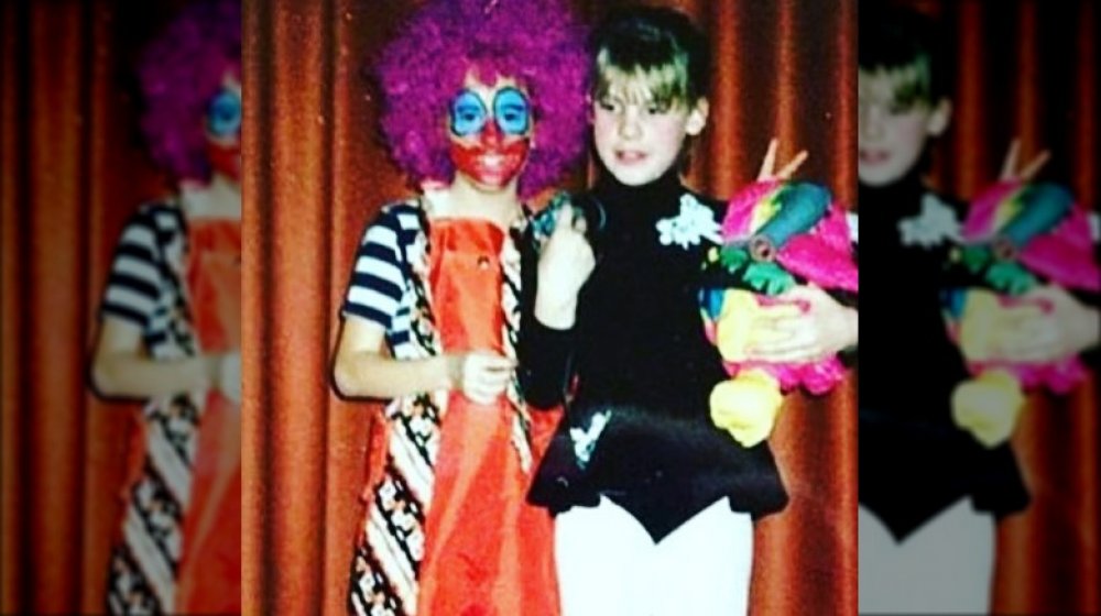 Pink as a girl on Halloween with a clown