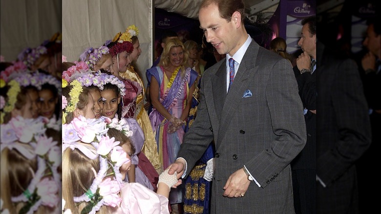 Prince Edward shaking hand