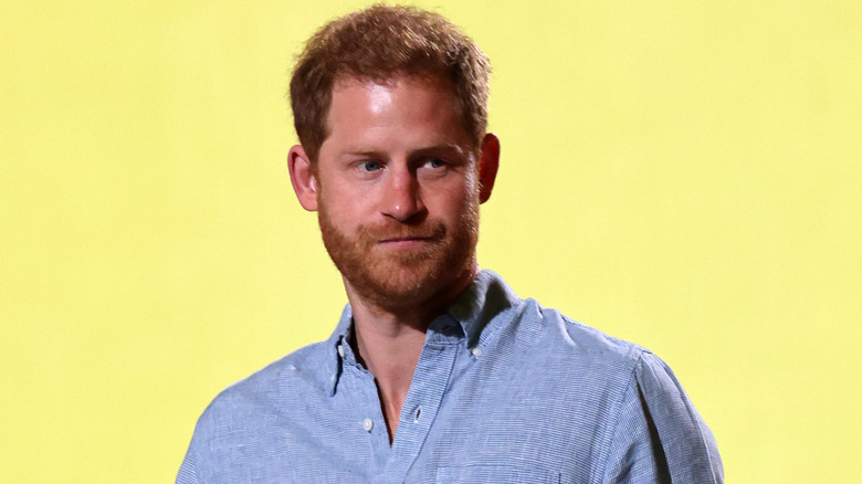 Meghan Markle sitting with Prince Harry