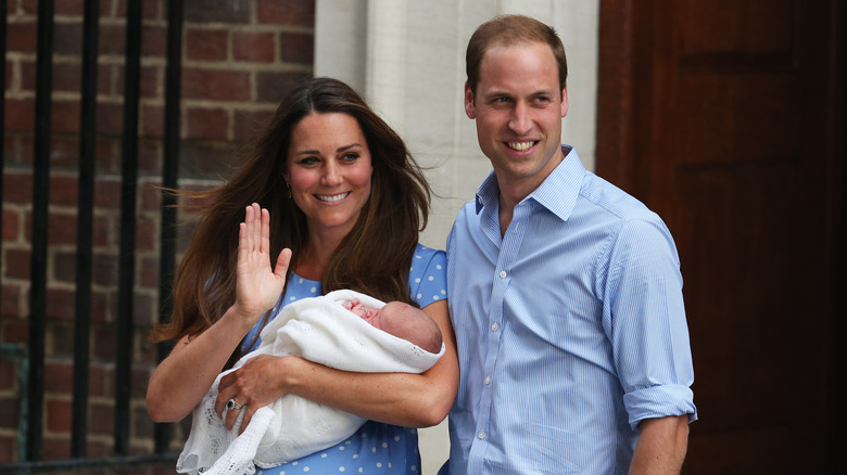 Kate Middleton and Prince William with baby George