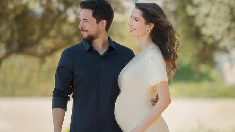 Crown Prince Al Hussein and Princess Rajwa pose for pregnancy photos