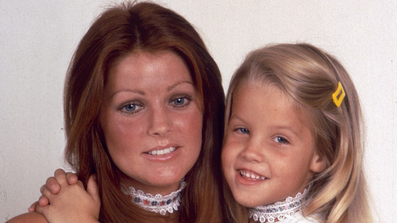 Priscilla Presley posing with Lisa Marie