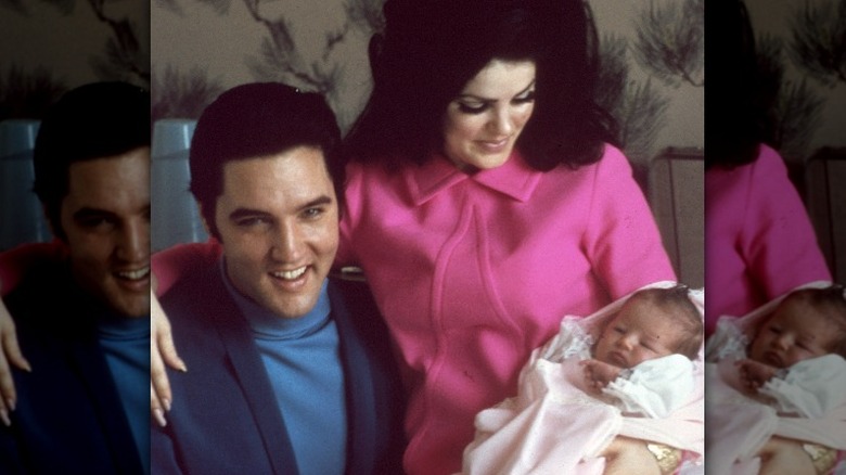 Priscilla Presley holding Lisa Marie