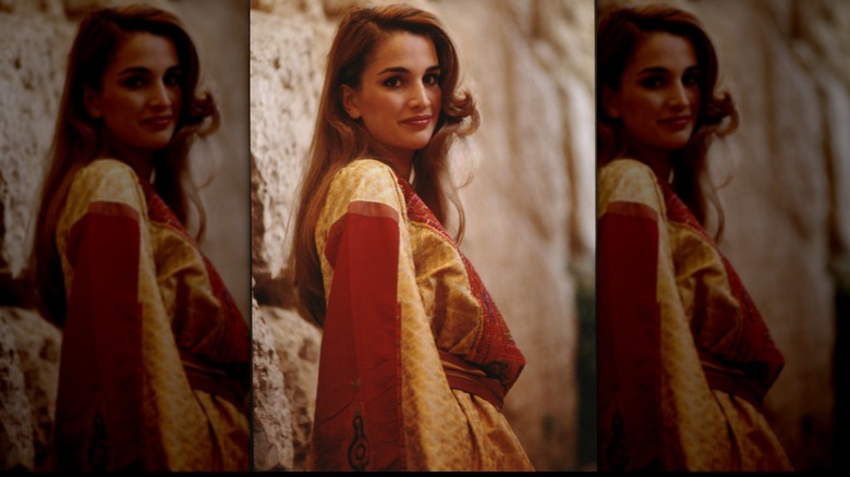 Young Queen Rania posing