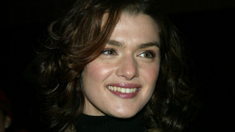 Young Rachel Weisz smiling