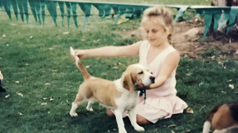 young Rebel Wilson with dog