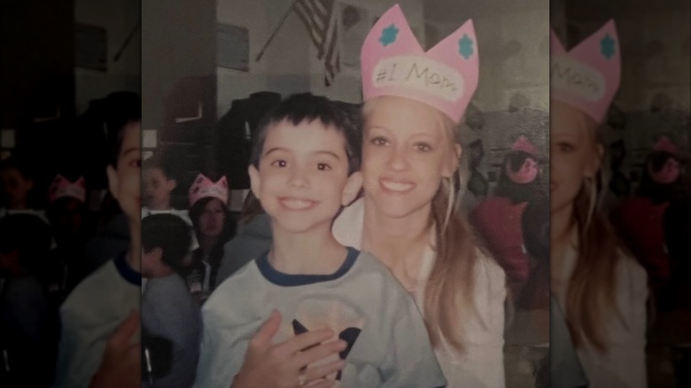 Nicole Curtis posing with her son in 2003