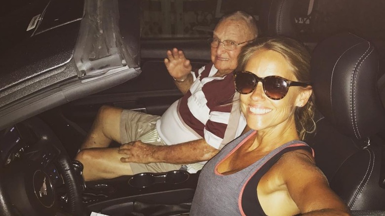 Nicole Curtis and her grandfather in a car