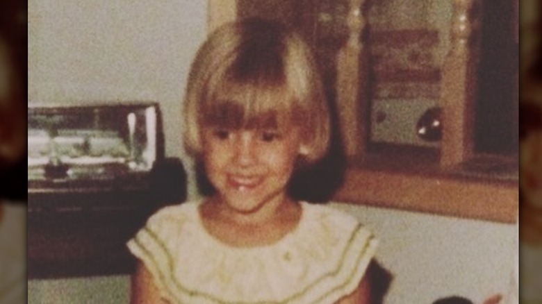 Nicole Curtis as a smiling child