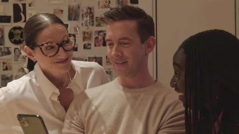 Jenna Lyons smiling at two people 