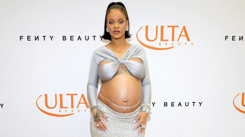 Rihanna showing off her baby bump