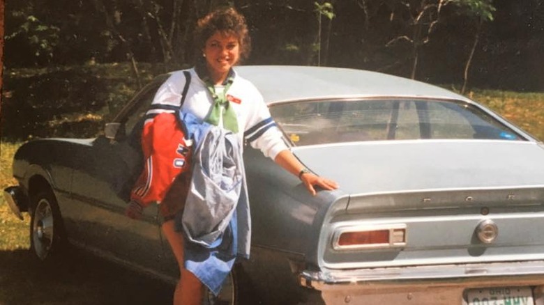 Robin Meade poses next to her car in the '80s