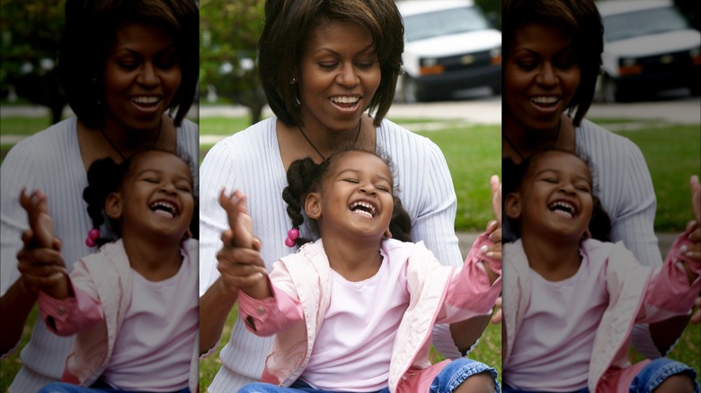 Sasha Obama laughing with her mom