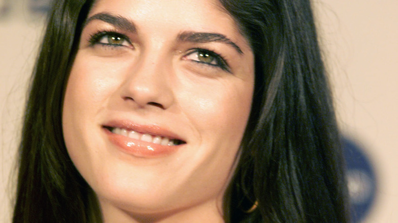 Selma Blair as a young woman