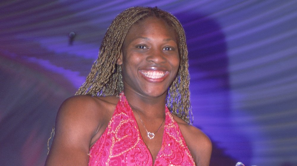 Serena Williams with a trophy in 2001