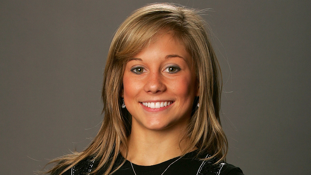 Shawn Johnson smiling, wearing makeup