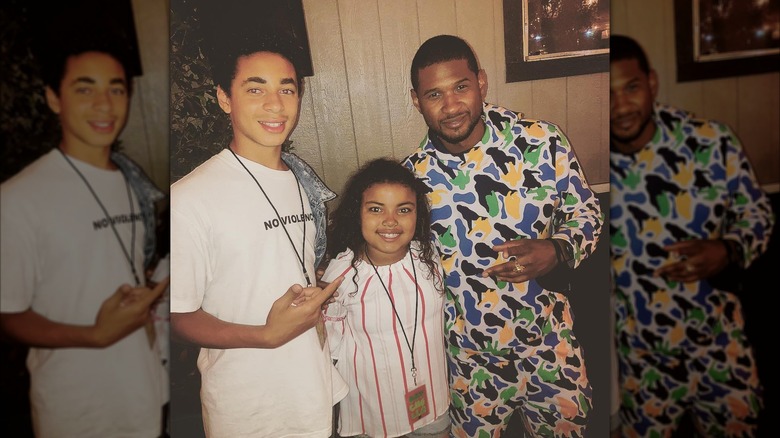 Julez Smith, Saniya Smith, and Usher posing for a picture at Coachella 2018