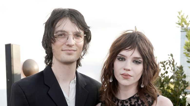 Austin Feinstein and Sophie Thatcher standing together at Elle Hollywood rising event