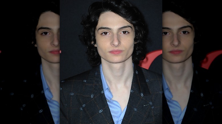 Finn Wolfhard wearing a suit 