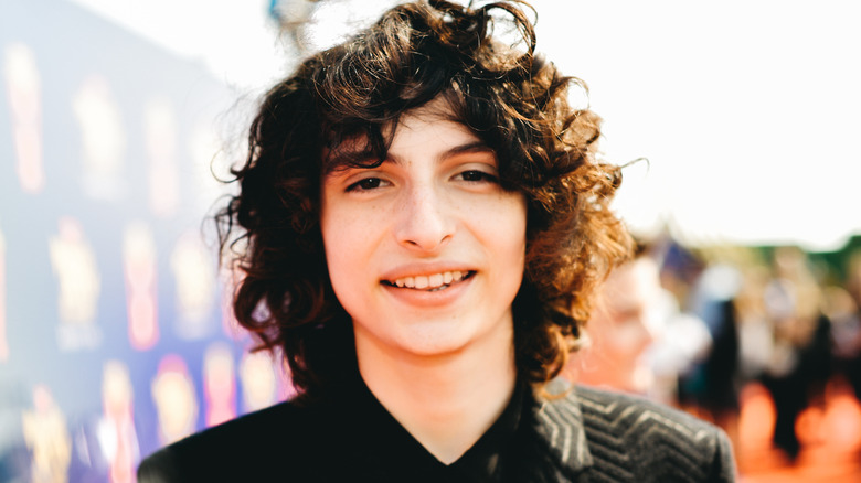 Finn Wolfhard with curly hair 