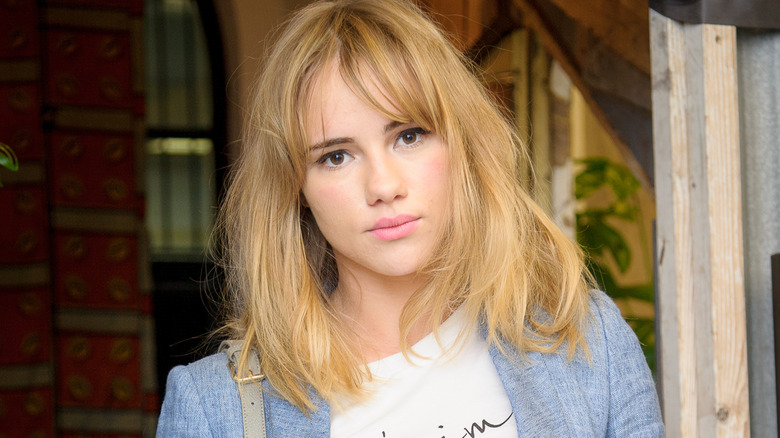 Suki Waterhouse in a blue jacket