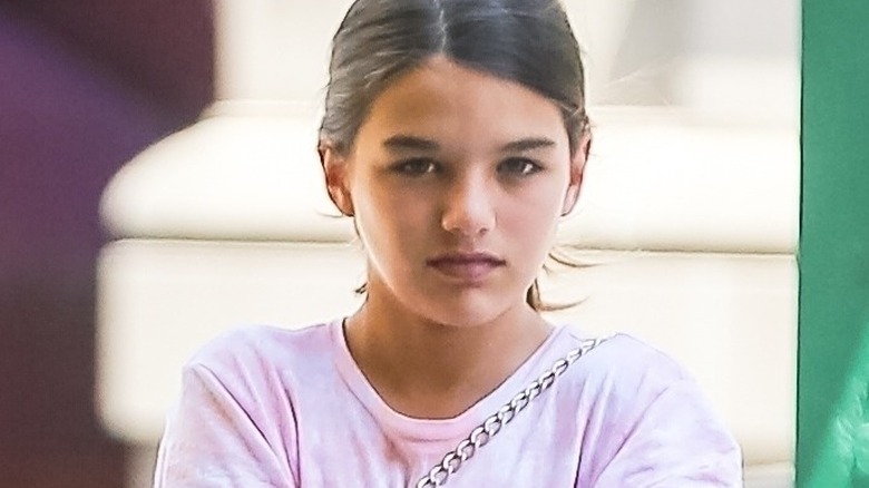 Suri Cruise medium shot hair pulled back tween