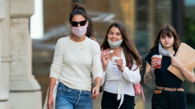 Katie Holmes and Suri Cruise in masks 