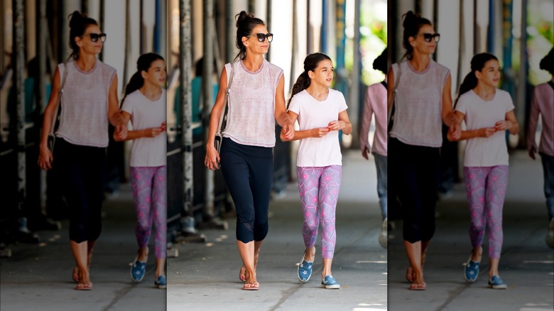 Suri Cruise and Katie Holmes in workout gear 