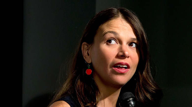 Sutton Foster speaking into a microphone