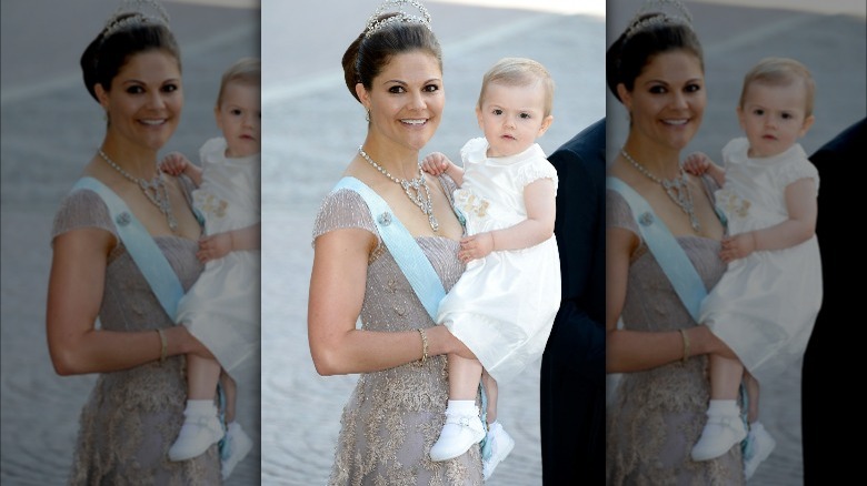 Crown Princess Victoria holding baby