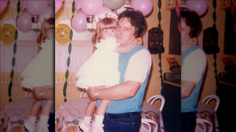 Young Tara Lipinski with her father