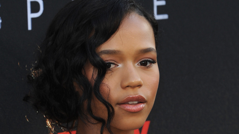 Taylor Russell posing on the red carpet