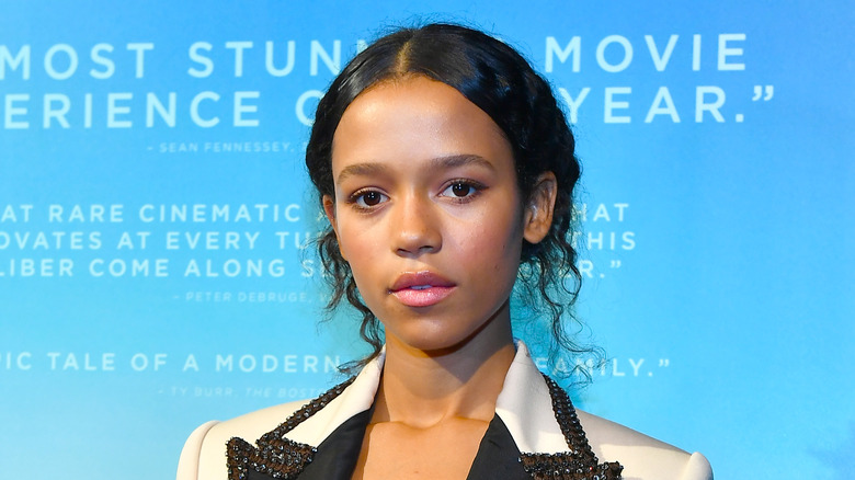 Taylor Russell looking directly into camera