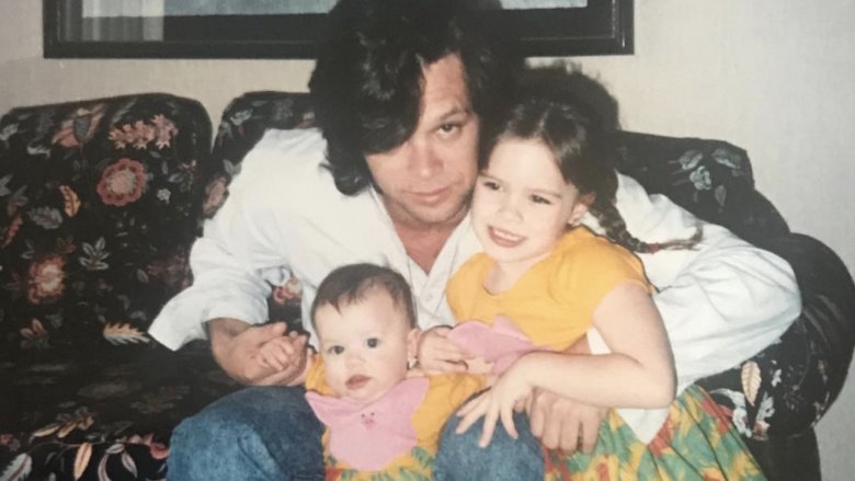 Young Teddi Jo Mellencamp with her baby sister Justice and father John Mellencamp