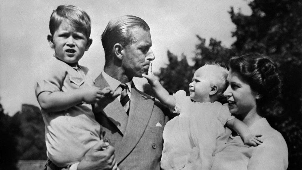 Princess Anne, Prince Charles, Prince Philip, and Queen Elizabeth