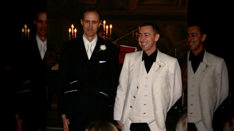 Grant Shaffer in a black tuxedo and Alan Cumming in a white one, on their wedding day