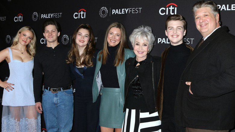 Emily Osment, Montana Jordan, Raegan Revord, Zoe Perry, Annie Potts, Iain Armitage, and Lance Barber smiling at the Dolby Theater in 2024