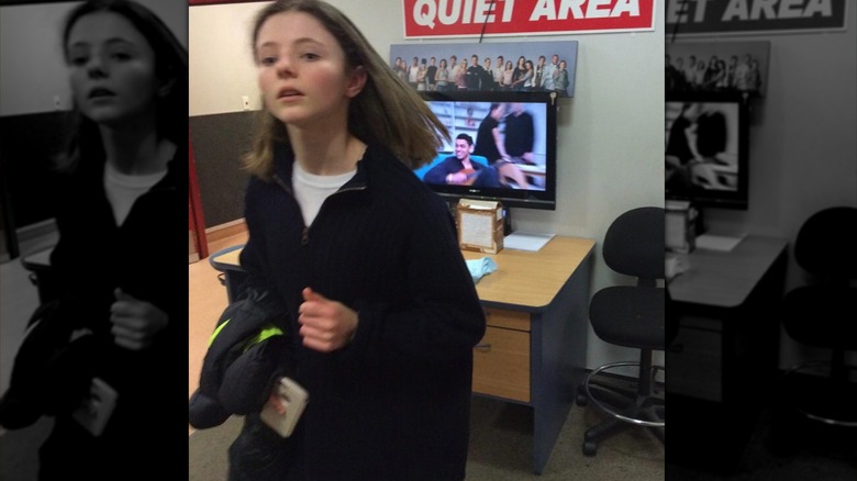 Thomasin McKenzie as a teenager walking on set