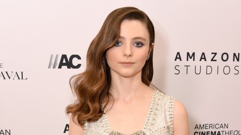 Thomasin McKenzie as an adult posing