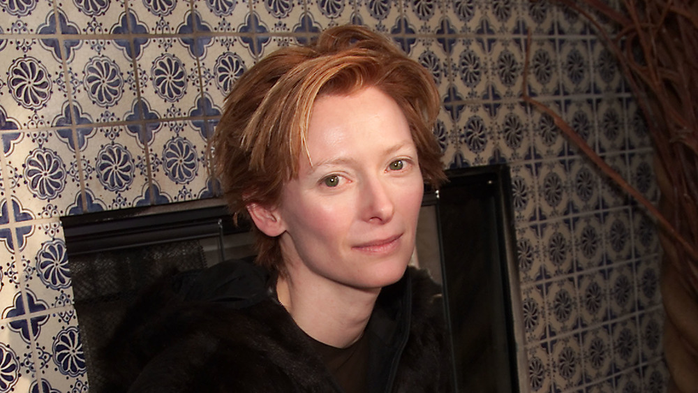 Tilda Swinton sitting