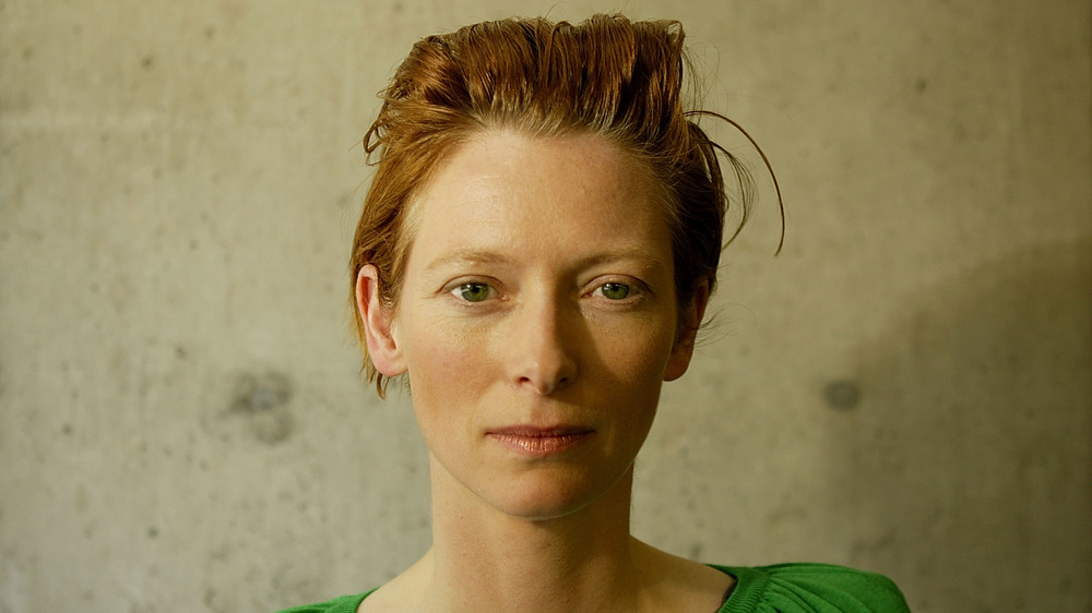 Tilda Swinton wearing green