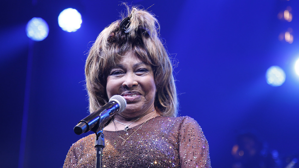 Tina Turner smiling on stage