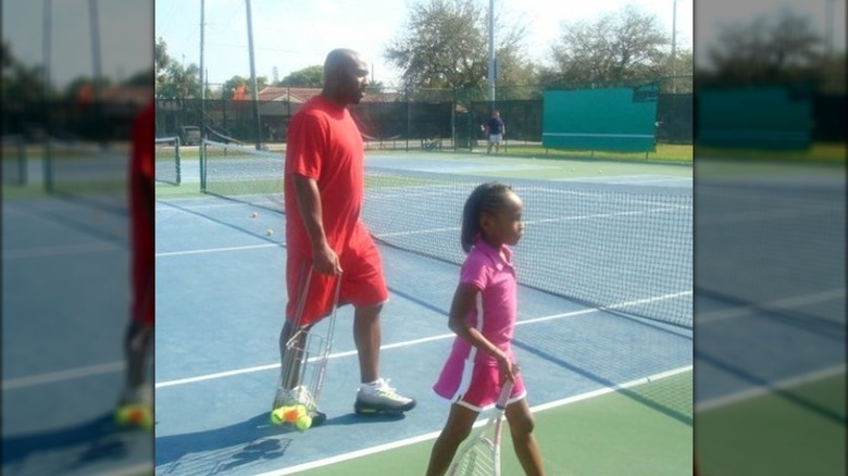 Coco and Corey Gauff hugging 