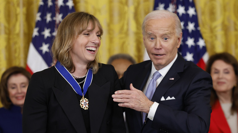 Katie Ledecky receiving the Presidential Medal of Freedom from President Joe Biden