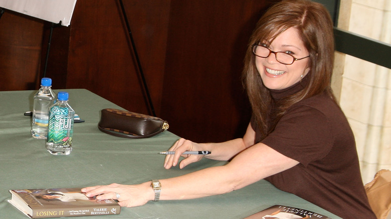 Valerie Bertinelli posing for photos at her book signing event